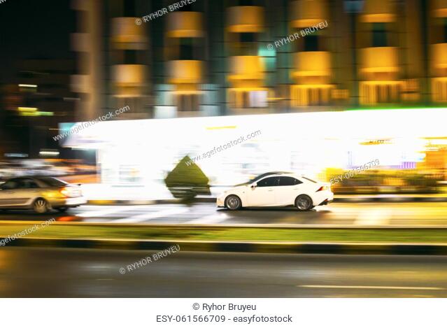 Speeding Car Fast Driving In City Street. Motion Blur Background