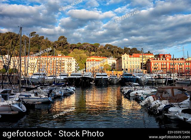 City of Nice in France at sunrise, view across Port Lympia on French Riviera