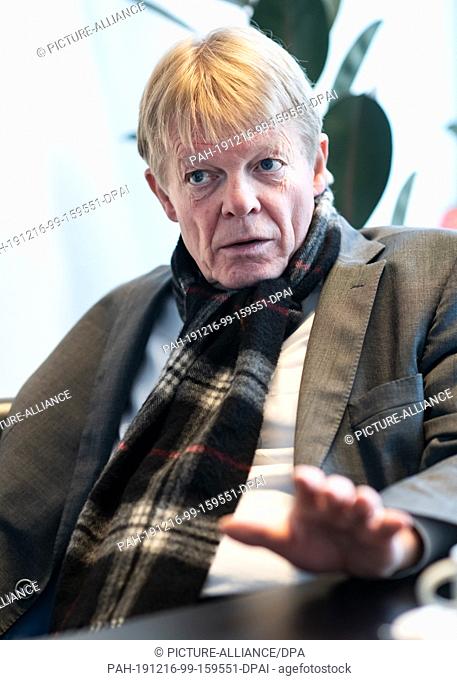 16 December 2019, Berlin: Reiner Hoffmann, chairman of the German Confederation of Trade Unions (DGB), sits in a meeting room next to his office during an...