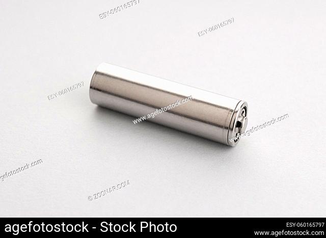 Blank metallic battery isolated on gray background