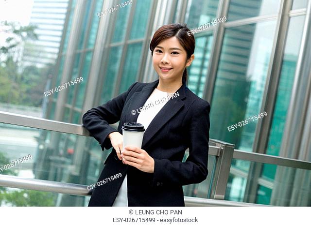 Businesswoman hold with coffee cup