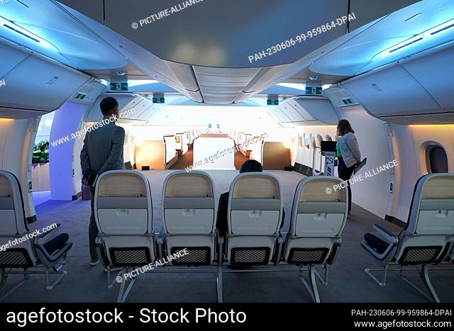 06 June 2023, Hamburg: A look inside the mock-up of a Boeing 777X cabin at the booth of aircraft manufacturer Boeing at the Aircraft Interiors Expo (AIX) in the...