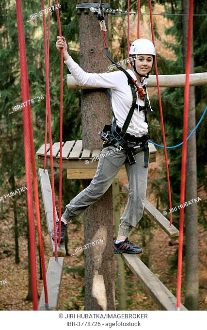 Girl, 13 years, in the climbing park, Svatý Linhart, Karlovy Vary, Region Karlovy Vary, Bohemia, Czech Republic, Europe