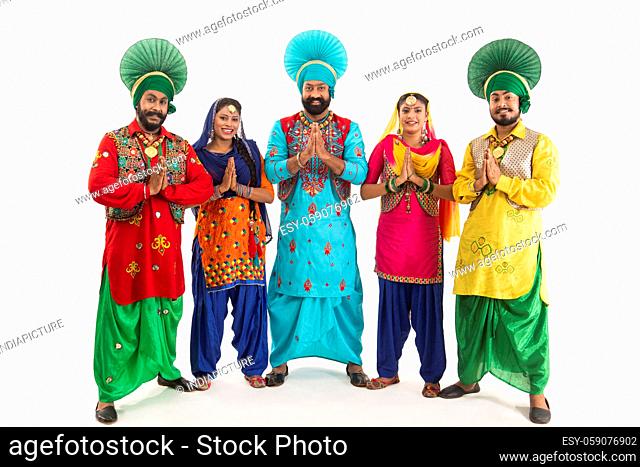 A Troupe of Punjabi Folk Dancers greeting with Namastey