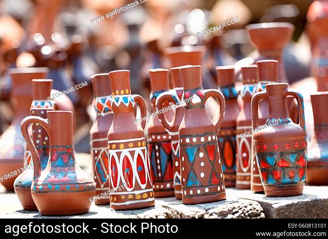 Traditional handmade pottery on display at street market in Tbilisi, Georgia