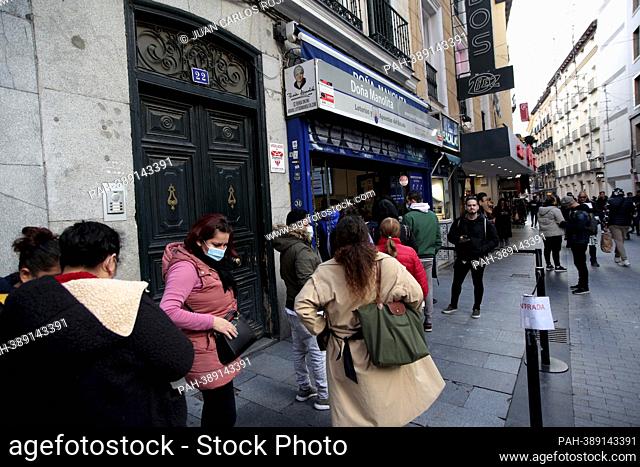 Madrid, Spain; 21.12.2022.- Queue to buy at Doña Manolita (Most famous place in Madrid) ticket for Extraordinary Christmas Draw, known as Christmas Lottery