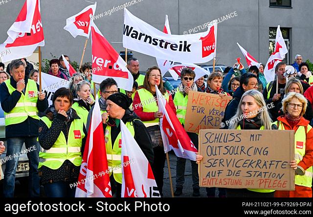 21 October 2021, Brandenburg, Potsdam: Employees of Asklepios clinics demonstrate at the Ministry of Health for better working conditions