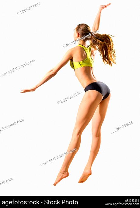 Young woman beach volleyball player (without ball version)