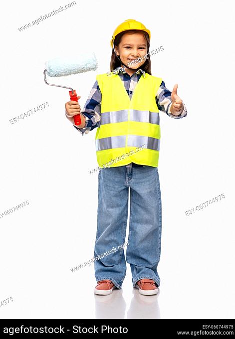 girl in helmet with paint roller showing thumbs up