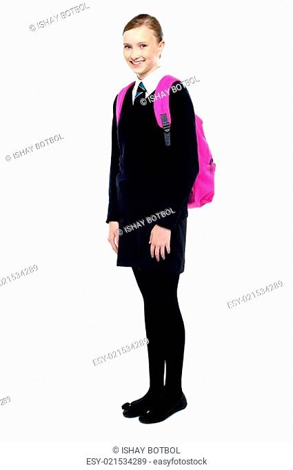 Schoolgirl in uniform, full length shot