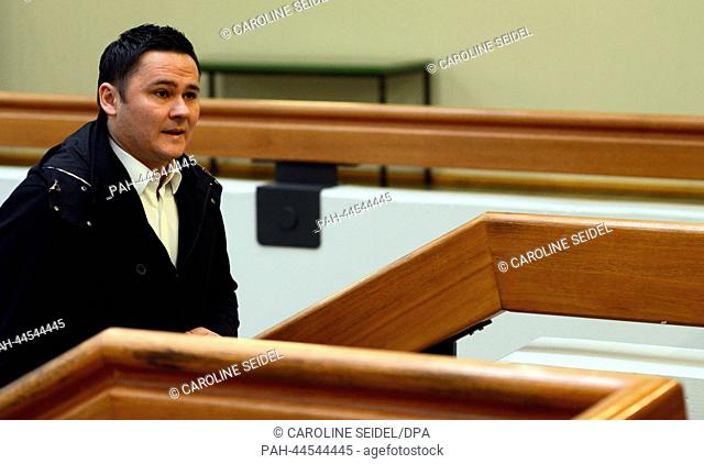 Defendent Ante Sapina (C), accused of organized fraud, waits for the start of new hearings into the largest European betting scandal in the regional court in...