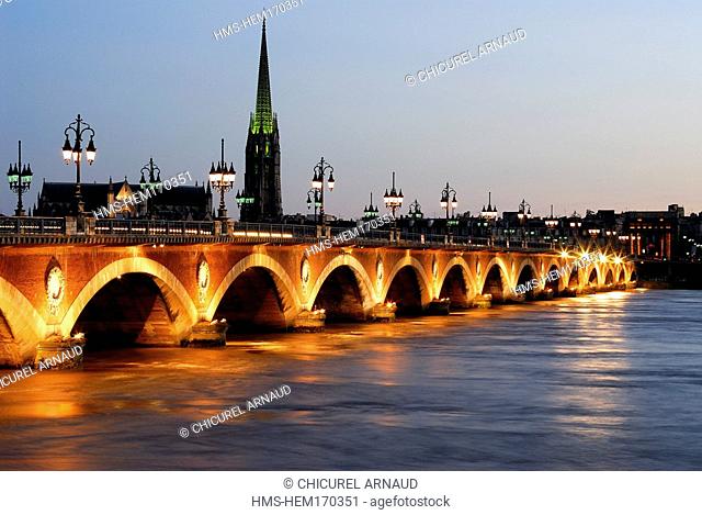 France, Gironde, Bordeaux, area listed as World Heritage by UNESCO, Pont de Pierre above Garonne River and Saint Michel Basilica