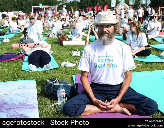 RUSSIA, MOSCOW - JULY 2, 2023: A man is seen during Yoga Day Russia 2023, a yoga festival marking the International Day of Yoga in Tsaritsyno Park