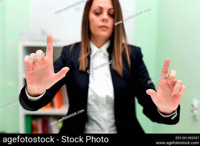 Businesswoman Pointing Crutial Informations With Two Fingers