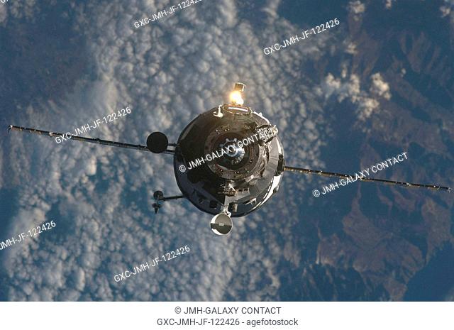 An unpiloted Progress supply vehicle approaches the International Space Station, bringing more than two tons of food, fuel and other supplies to the Expedition...