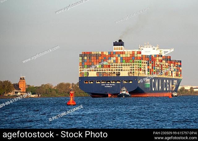 09 May 2023, Hamburg: The LNG-fueled container ship ""CMA CGM Rivoli"" of the shipping company CMA CGM leaves the port in the morning