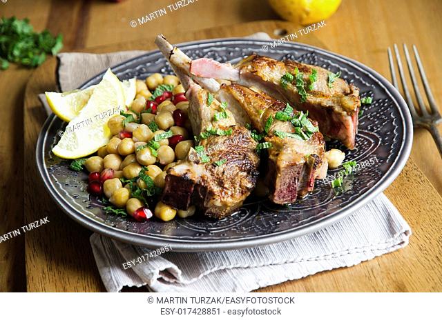 Harissa lamb with chickpeas and pomegranate seeds