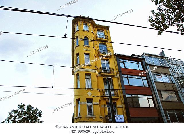 Tram Cables and office and apartment buildings on the Divan Yolu Caddesi. Sultanahmet, Istanbul, Turkey