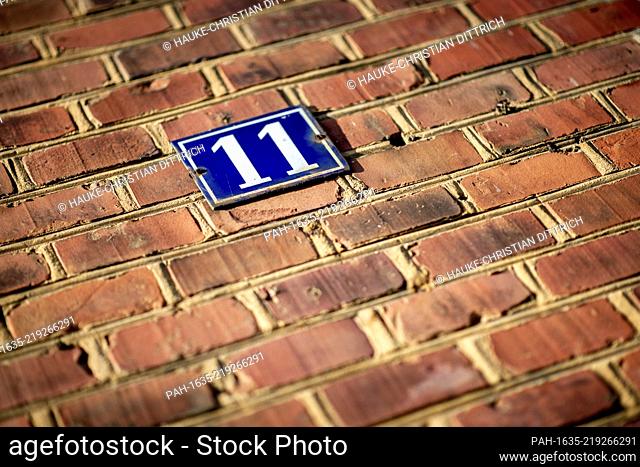 The house number eleven in front of the historic building of the high school ""Altes Gymnasium"" in Oldenburg (Germany), 23 April 2020