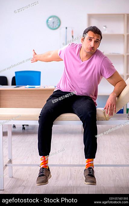 Male patient waiting for doctor in the clinic