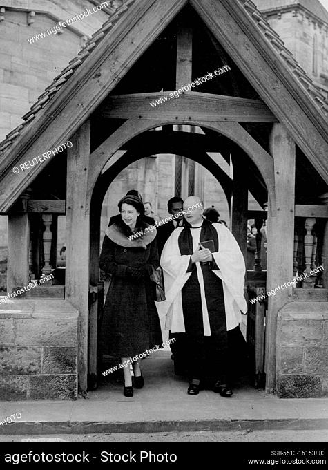 Queen At 'Mothering Sunday' Service. The Queen, herself the mother of two children, leaves with the Vicar, the Reverend C.W.F