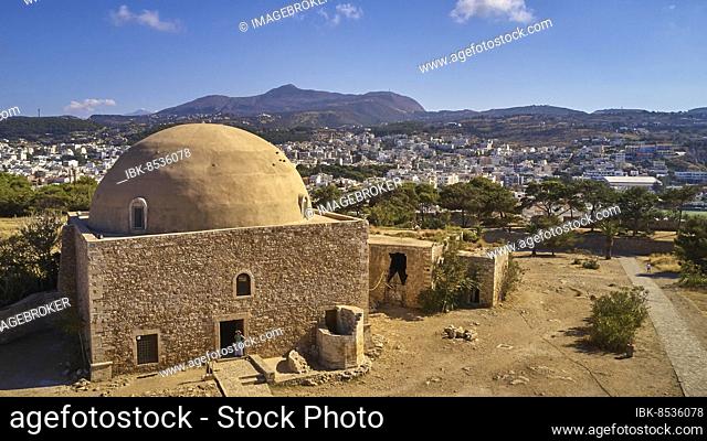 Fortezza, Venetian sea fortress, drone shot, mosque, mountain, blue sky, few grey-white clouds, Rethimnon, central Crete, island of Crete, Greece, Europe