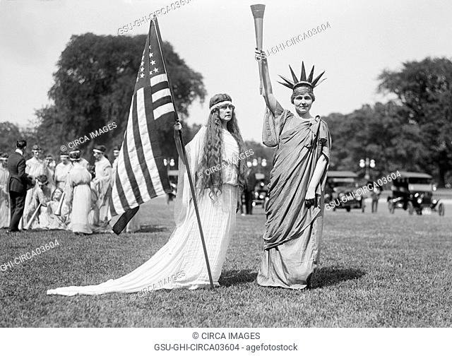 Woman with American Flag and Women in Statue of Liberty Costume, Fourth of July Celebration, the Ellipse, Washington DC, USA, Harris & Ewing, 1919
