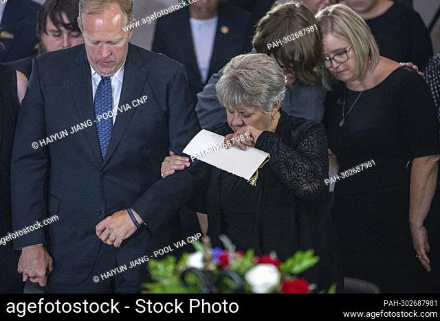 Tracie Ross a member of Woodrow “Woody” Williams’ family, gets emotional at a Lying in Honor event on Capitol Hill for Williams in the Rotunda on Thursday