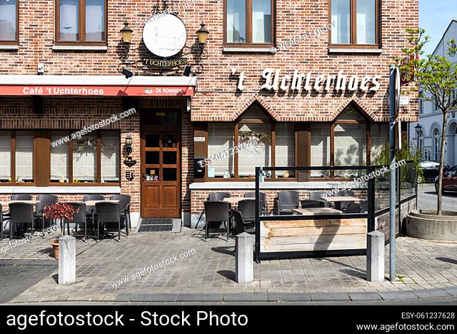 Dilsen, Limburg, Belgium - 04 14 2022 - Cafe Uchterhoes, a local pub with brick stone facade