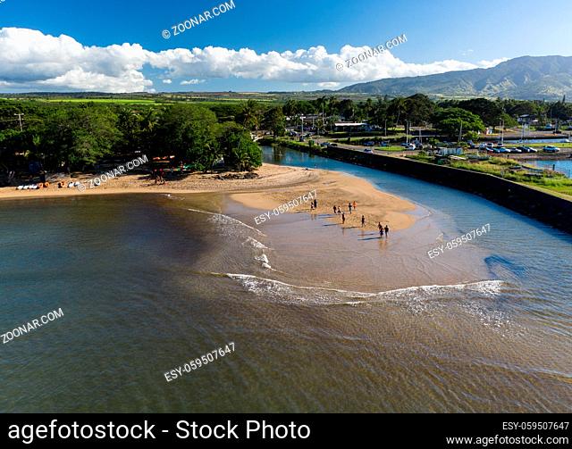 Aerial shot of the river anahulu leading to the twin arched road bridge in the North Shore town of Haleiwa