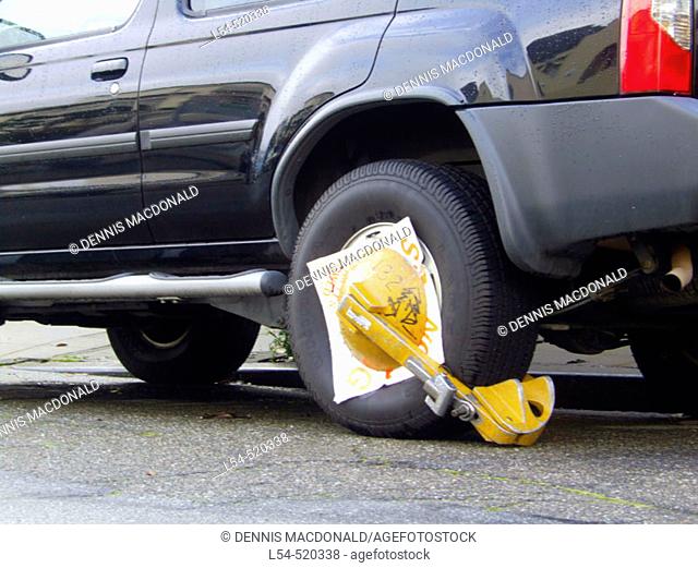 Wheel tire lock automobile movement preventer is place on a car as a result of being illegally parked