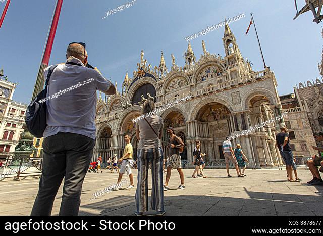 VENICE, ITALY: Saint Mark cathedral in Venice with people