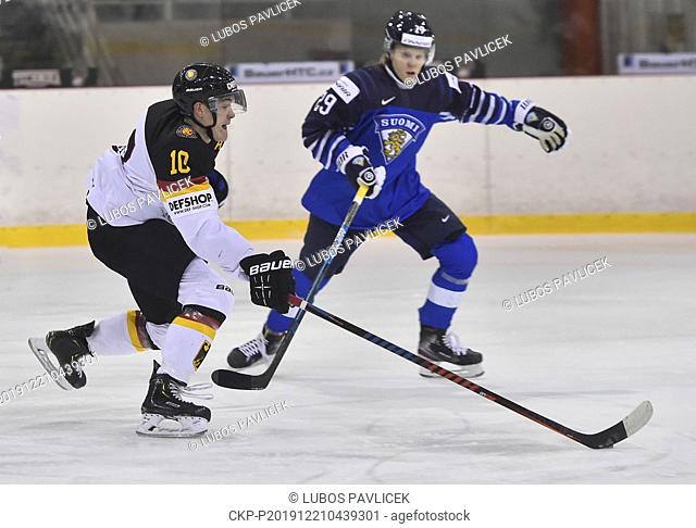 L-R Justin Schutz (GER) and Kim Nousiainen (FIN) in action during a preliminary match Germany vs Finland prior to the 2020 IIHF World Junior Ice Hockey...
