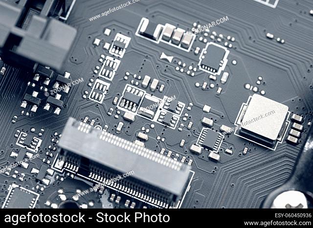 Electronic Circuit Chip of a computer motherboard. Abstract background technology