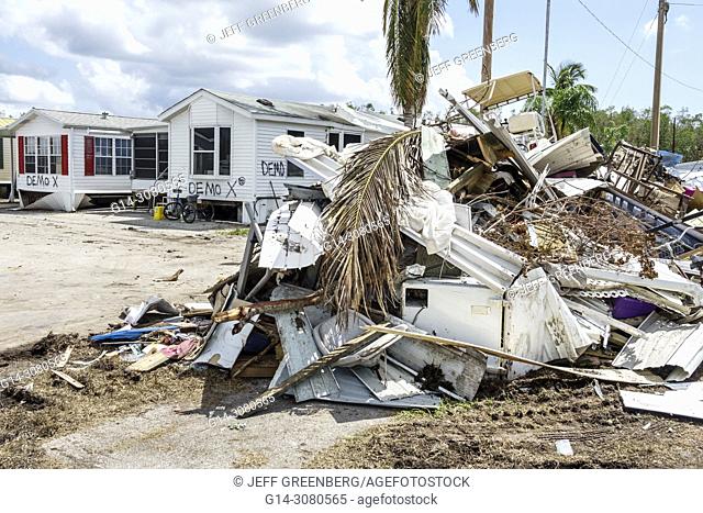 Florida, Everglades City, after Hurricane Irma, houses homes residences, storm disaster recovery cleanup, flood surge damage destruction aftermath, trash