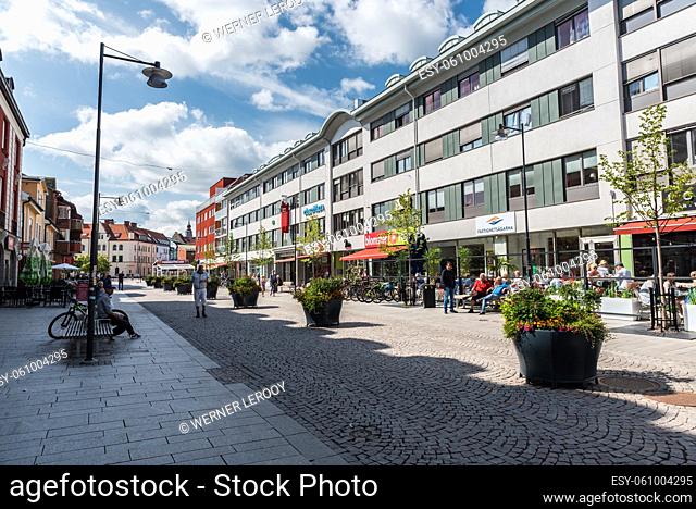 Falun, Dalarna- Sweden - 08 05 2019: People resting and walking in the shoppingstreet