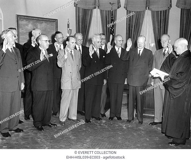 Swearing in of the Second Hoover Commission by Justice Harold H. Burton (right). 80 year old former President Herbert Hoover stands next to President Dwight...