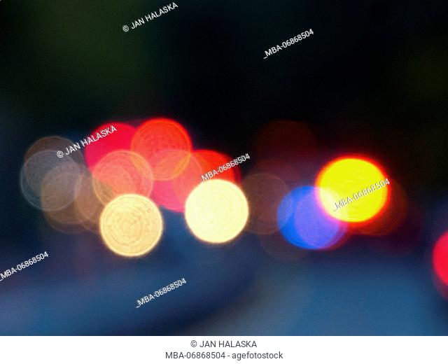 Out of focus images of emergency vehicles, police, fire trucks, etc., attending a car accident
