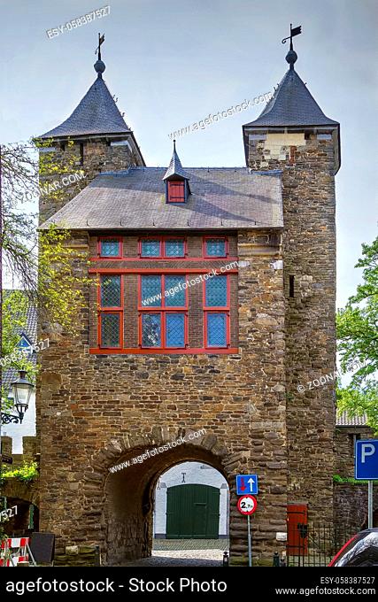 Helpoort, or Hell Gate, is the oldest city gate in the country, Maastricht, Netherlands. View from the yard