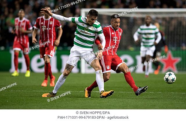Corentin Tolisso (r) of Bayern and Nir Bitton of Celtic vie for the ball during the Champions League football match between Glasgow's Celtic FC and FC Bayern...