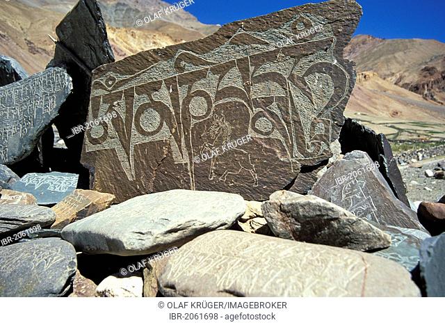 Prayer stone with the widespread Buddhist mantra Om Mani Padme Hum on it, Zanskar valley, Zanskar, Ladakh, Jammu and Kashmir, Indian Himalayas, northern India