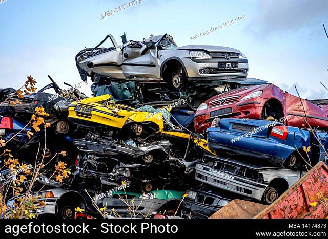 Junkyard, junk cars, stacked