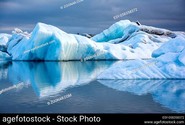 Iceberg in Jokulsarlon glacier lake in Iceland. The icebergs, originating from the Vatnajokull float. This location was used for various action movies