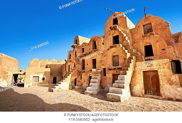 Ksar Ouled Soltane, a traditional Berber and Arab fortified adobe vaulted granary cellars, or ghorfas, situated on the edge of the northern Sahara in the...
