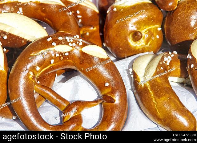 German pretzels and the like displayed in the window of a bread shop