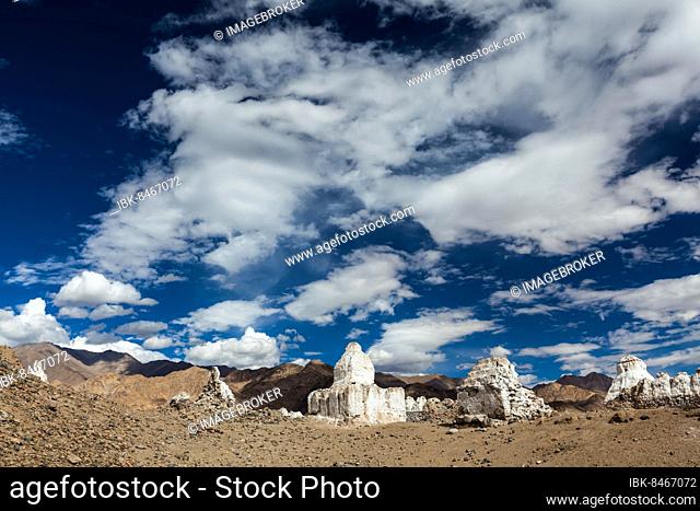 Whitewashed chortens (Tibetan Buddhist stupas) . Ladakh, Jammu and Kashmir, India, Asia