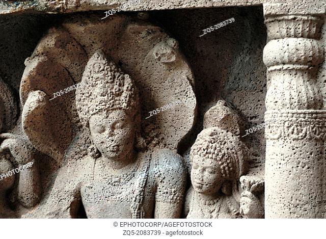 Cave 19 : Left wing of façade showing Nagaraja (snake king) and his consort nagini. Ajanta Caves, Aurangabad, Maharashtra, India