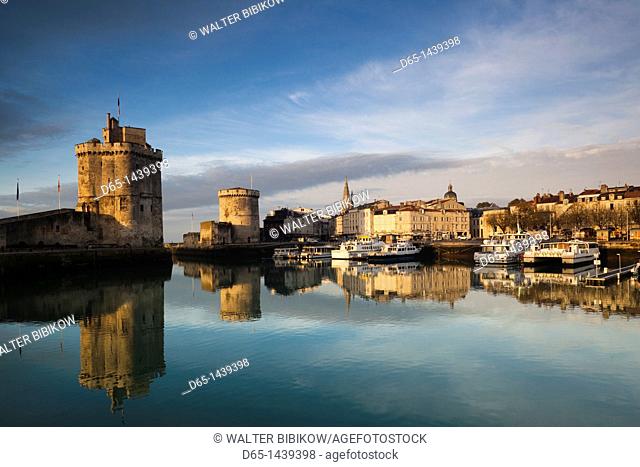 France, Poitou-Charentes Region, Charente-Maritime Department, La Rochelle, Old Port, Tour St-Nicholas and Tour de la Chaine towers, morning