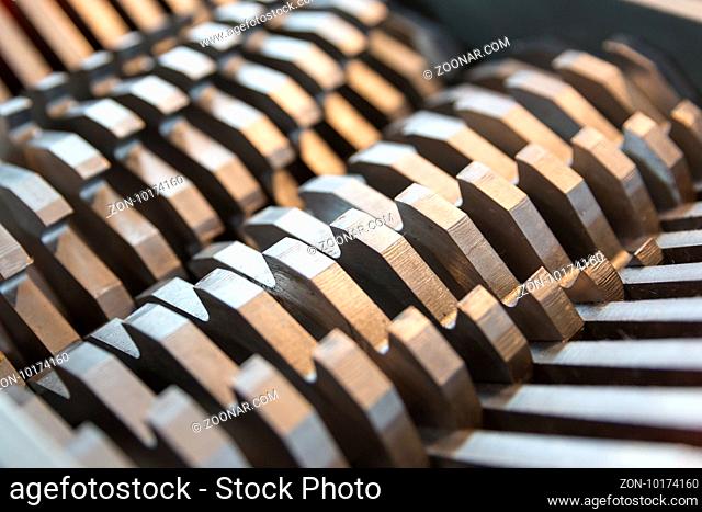 Metal blades of a chopper machine. New sharp blades made of hardened steel. Ready to cut anything. Closeup