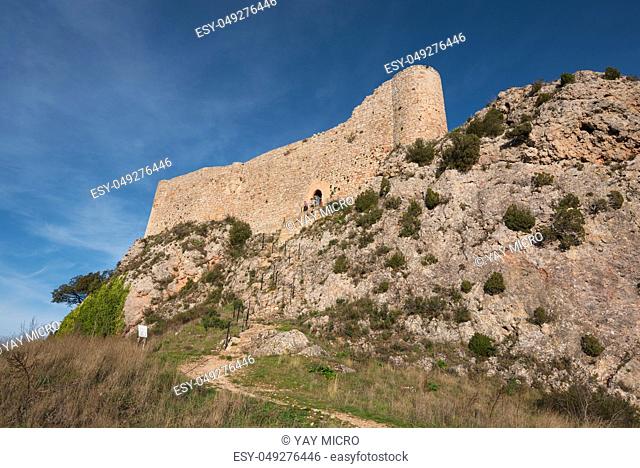 Tourist visiting Medieval castle in Poza de la Sal, Burgos, Spain